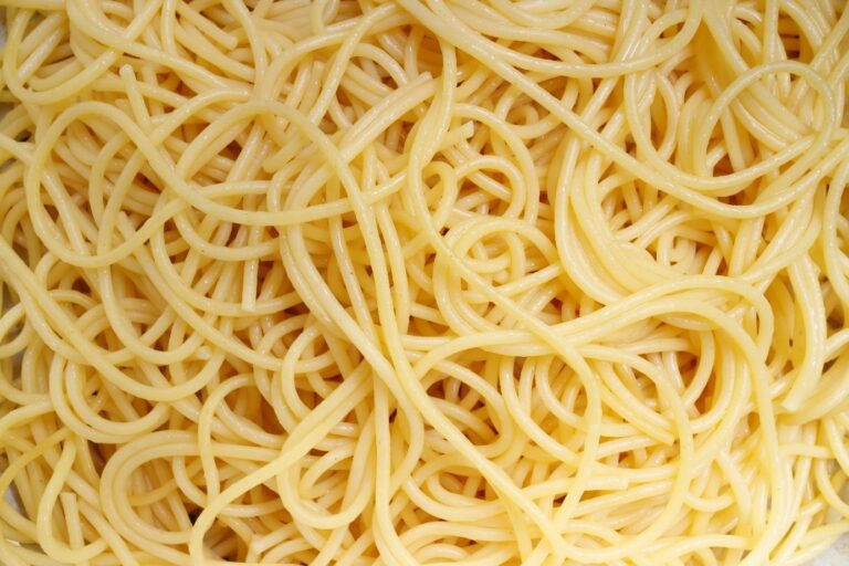 Close-up view of cooked spaghetti noodles tangled together.