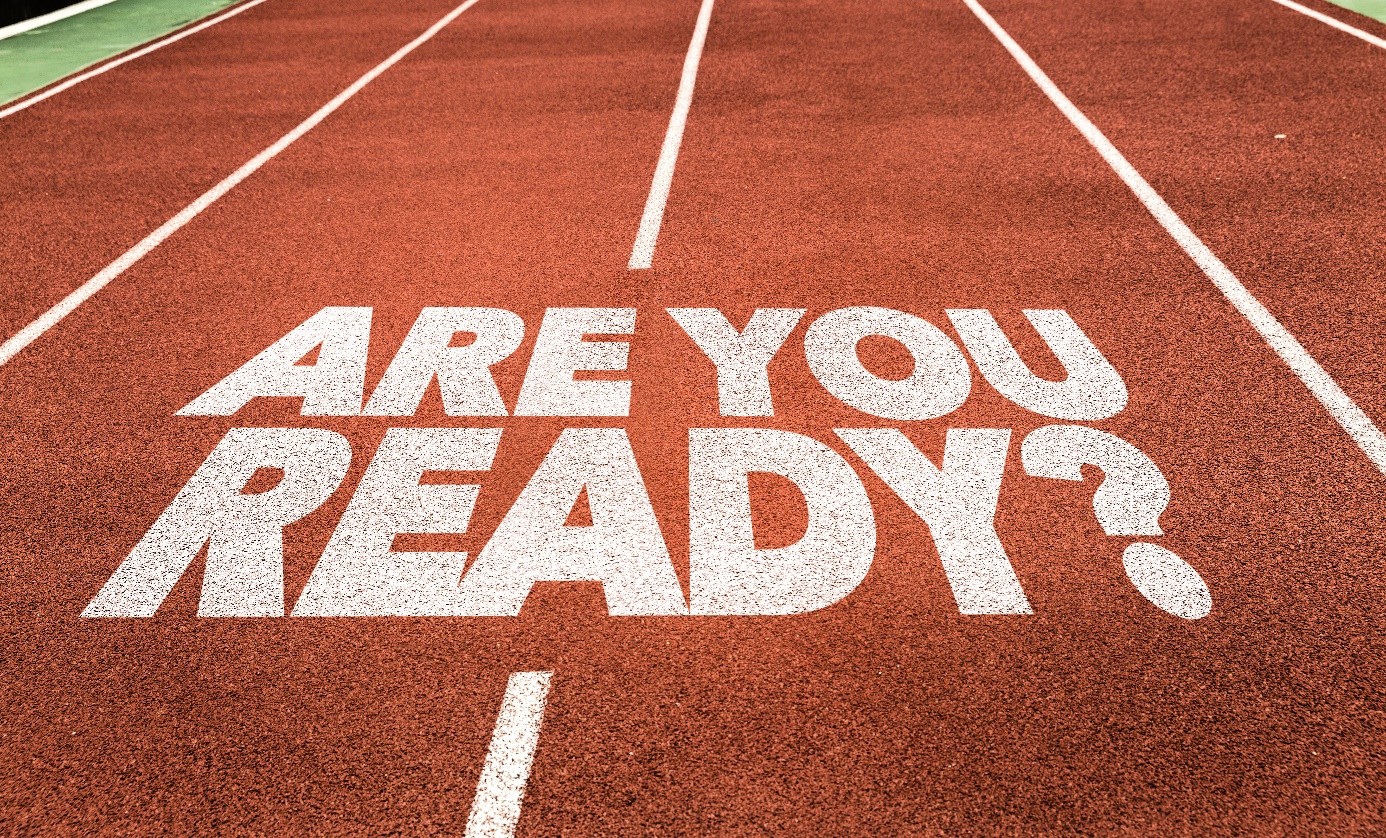 Track lanes with "ARE YOU READY?" written in bold white letters on the red surface.