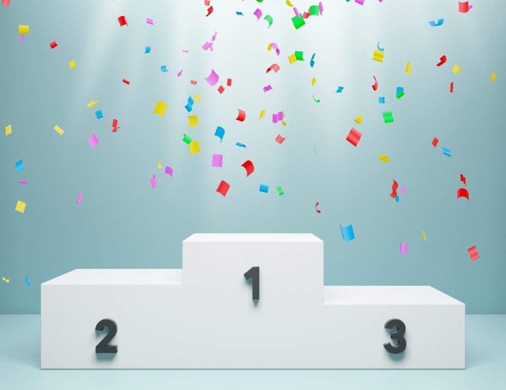 colored confetti falling on a podium, illustrating the way many companies set supply chain priorities