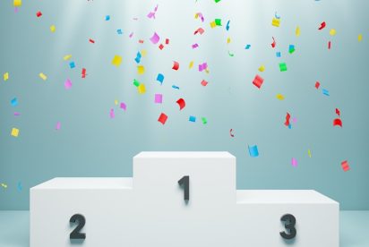 colored confetti falling on a podium, illustrating the way many companies set supply chain priorities